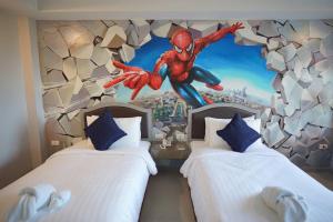 Postel nebo postele na pokoji v ubytování BCP Hotel