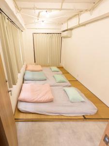 Cama o camas de una habitación en Guesthouse Sensu