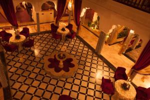 an overhead view of a restaurant with tables and chairs at Villa Des Ambassadors in Rabat