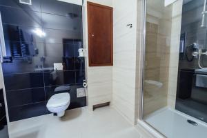 Kúpeľňa v ubytovaní Hotel Rezydent