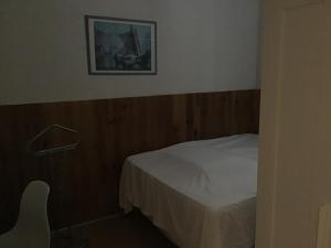 Postel nebo postele na pokoji v ubytování L'ilot Fleuri