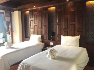 Voodi või voodid majutusasutuse JJ Residence toas
