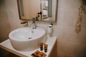 Koupelna v ubytování Hotel La Contrada