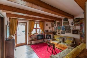 Atpūtas zona naktsmītnē ALTIDO Big Flat for 6 with Backyard and Parking in Courmayeur