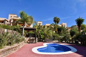 Bazén v ubytovaní Bahia Marinas - Tu hogar con jardín privado! alebo v jeho blízkosti