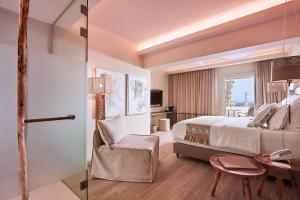 Cama ou camas em um quarto em Palladium Hotel