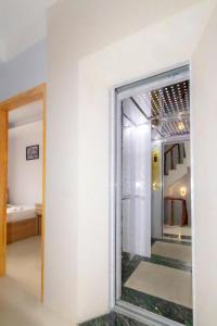 Postel nebo postele na pokoji v ubytování Trưởng Sky Hotel Đà Lạt