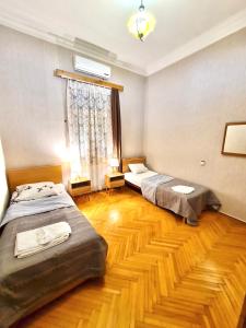 Кровать или кровати в номере Guesthouse Zedafoni