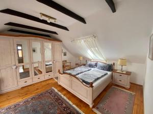 Katil atau katil-katil dalam bilik di Haus Masur