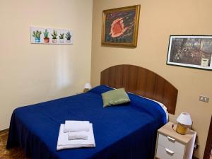 Postel nebo postele na pokoji v ubytování b&b Casa di Antonio_Etna Vacanze