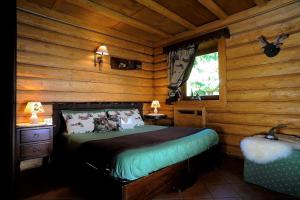 Postel nebo postele na pokoji v ubytování Residence Foyer D'Antan