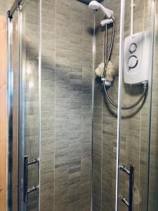 Een badkamer bij Indigo Lodge - Aberdovey