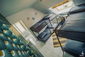 an overhead view of a bedroom with two bunk beds at Maison PISCINE INTERIEURE et GARAGE in Troyes