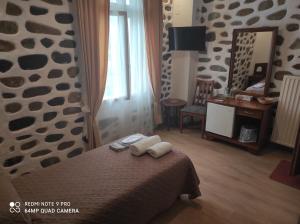 Posteľ alebo postele v izbe v ubytovaní Porto Lesvos hotel