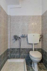 Kúpeľňa v ubytovaní Servani Studios & Suites