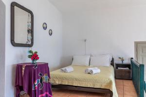 Posteľ alebo postele v izbe v ubytovaní Servani Studios & Suites