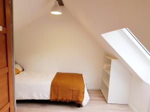 Ein Bett oder Betten in einem Zimmer der Unterkunft Gîte de Beg Menez Le 26 - Gîte à La Forêt-Fouesnant