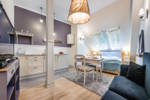 Kuchyňa alebo kuchynka v ubytovaní Apartamenty Kurort