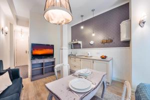 Kuchyňa alebo kuchynka v ubytovaní Apartamenty Kurort