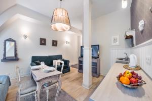 Kuchyňa alebo kuchynka v ubytovaní Apartamenty Kurort