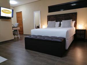 En eller flere senger på et rom på HWH Guesthouse Middelburg