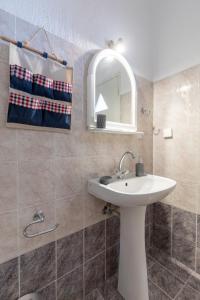 Kúpeľňa v ubytovaní Servani Studios & Suites