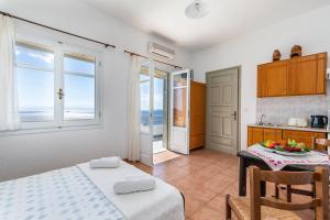 Kuchyňa alebo kuchynka v ubytovaní Servani Studios & Suites
