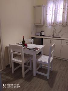 Kuchyň nebo kuchyňský kout v ubytování Moros Apartments