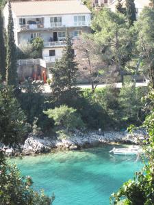 a view of a river with a boat in it at Apartments Žuvela in Korčula
