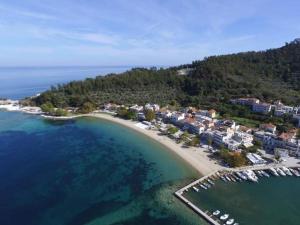 an aerial view of a beach with houses and the water at Bay View in Limenas