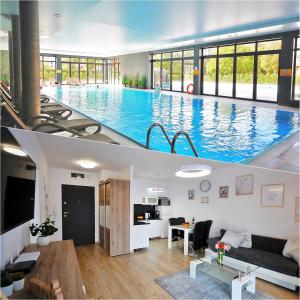 a living room and a swimming pool in a house at MICHELLE APARTMENT Polanki Park in Kołobrzeg