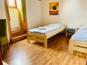 Voodi või voodid majutusasutuse Ubytování Bořeňovice toas