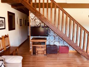 Telewizja i/lub zestaw kina domowego w obiekcie Casa Román II