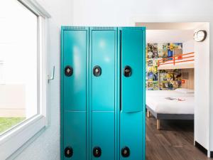 Postel nebo postele na pokoji v ubytování hotelF1 Mulhouse Centre Ouest