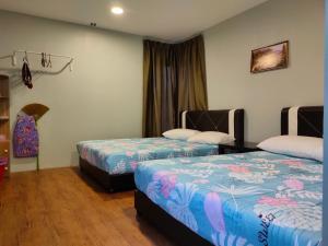 Кровать или кровати в номере Aleesa Roomstay