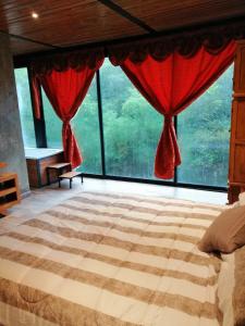 Letto o letti in una camera di Mazamitla Pinos del Rio