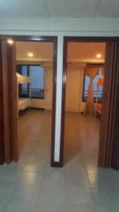 Ένα ή περισσότερα κρεβάτια σε δωμάτιο στο Aptos Majos centro