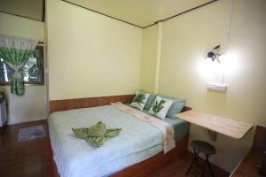 Ένα ή περισσότερα κρεβάτια σε δωμάτιο στο Mata Guesthouse