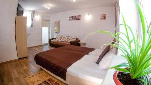 Giường trong phòng chung tại Nice & Cozy Apartments