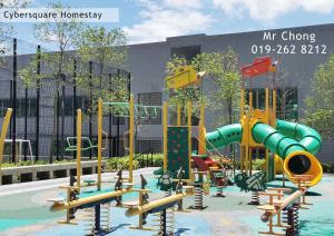 a playground in front of a building at Cybersqaure Studio Suites with Netfilx @10 min walking distance to McD in Cyberjaya