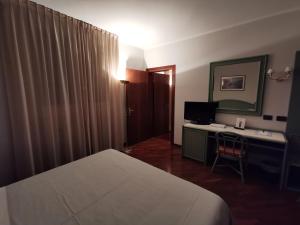 Postel nebo postele na pokoji v ubytování Hotel Le Ville + 31 fotografií