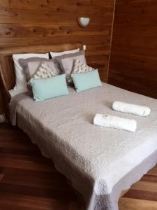 Кровать или кровати в номере Le papangue