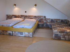 Postel nebo postele na pokoji v ubytování Privat Apartma Ulrych