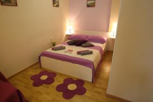 Postel nebo postele na pokoji v ubytování Miriam Rooms Zadar