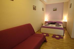 Postel nebo postele na pokoji v ubytování Miriam Rooms Zadar