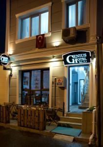 a restaurant with a sign on the front of a building at Genius Hotel Istanbul in Istanbul