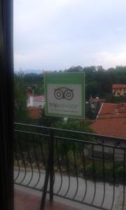 a sign for the tippazotech sign on a window at Smeštaj - sobe MARVEL in Niš