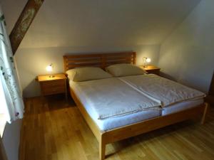 Postel nebo postele na pokoji v ubytování Gasthof Eschau