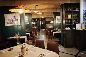 A restaurant or other place to eat at Hotel Fado Spa & Restaurant