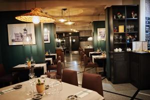 Reštaurácia alebo iné gastronomické zariadenie v ubytovaní Hotel Fado Spa & Restaurant